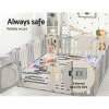 Baby playing safely inside secure indoor playpen