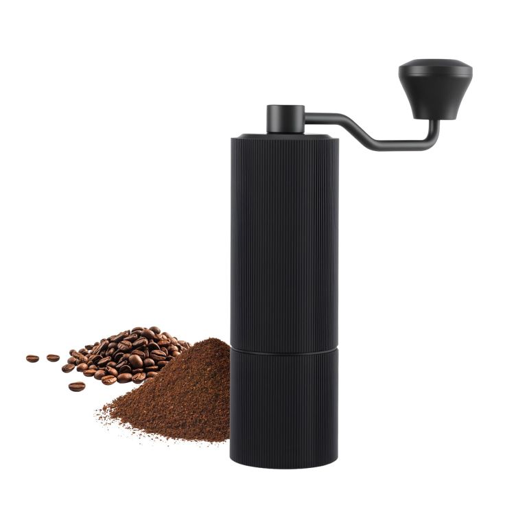cf g m 12 00.jpg Black manual coffee grinder with beans and grounds
