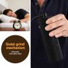 devanti manual coffee grinder with 24 adjustable settings | hand coffee bean burr mill for espresso french press | portable stainless steel quiet grinder with storage bag for travel camping, black Sleeping man beside alarm clock and coffee grinder