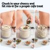 Adding chocolate lollies to ice cream maker