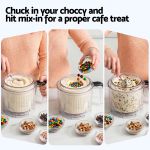 Adding chocolate lollies to ice cream maker