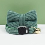 Green cat collar with bow and bell
