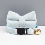 Light blue plush cat collar with bow and bell