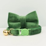 Green velvet pet collar with bow and bell