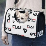 image 1 Chihuahua peeking from patterned pet carrier bag