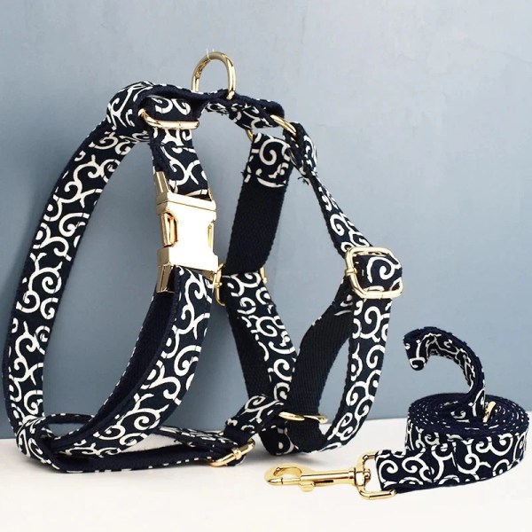Black and white patterned dog harness and leash