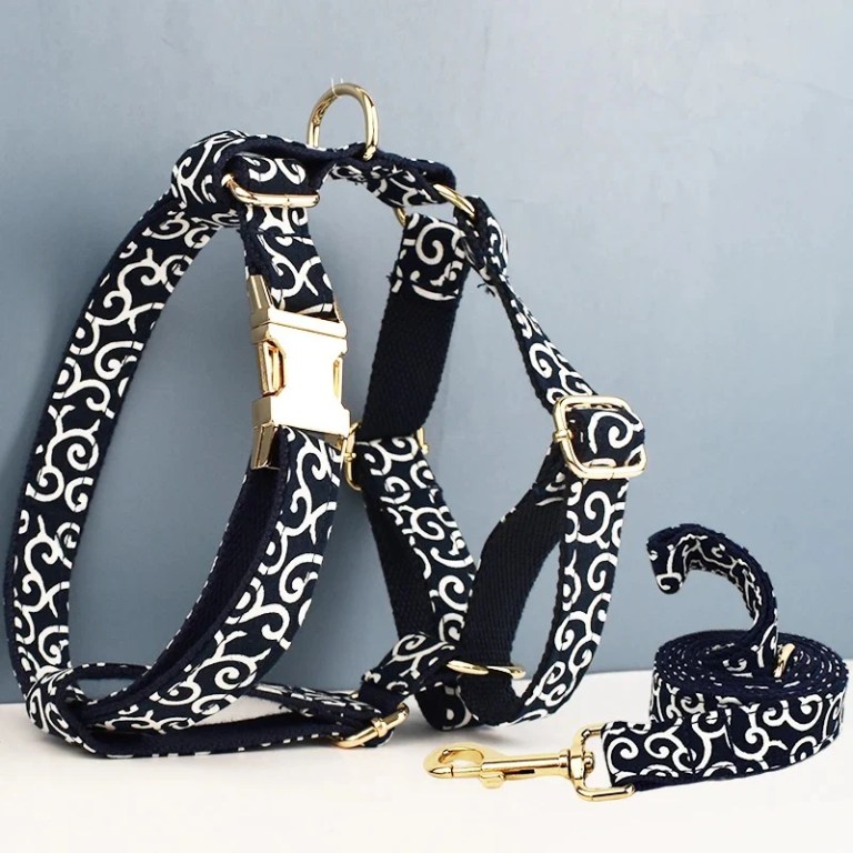 Black and white patterned dog harness and leash