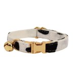 Black and white cat collar with gold bell