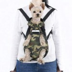 Small dog in camouflage front pet carrier