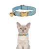 Light blue polka dot cat collar with bell