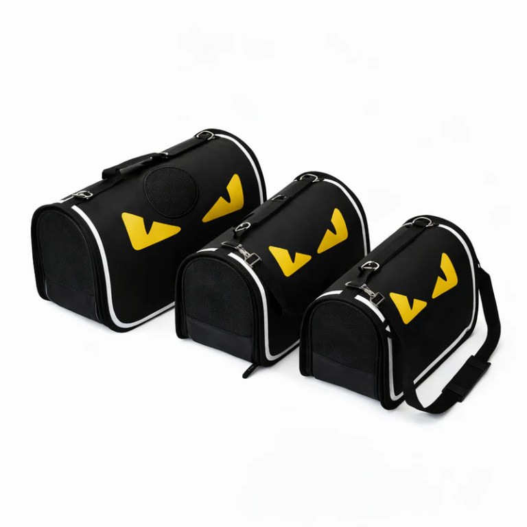 image 3 Three black pet carrier bags with yellow accents