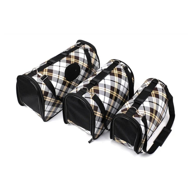 Three plaid pet carrier bags in different sizes