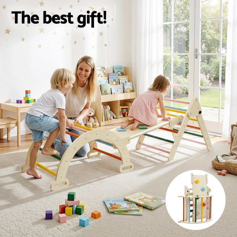 Mother and children playing on wooden climbing frame