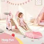 Toddler on pink indoor slide with hoop