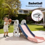 Toddler playing basketball beside backyard slide set