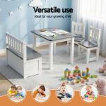 Children’s table and chairs in bright playroom