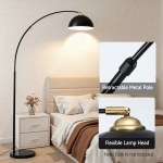 Modern black arched floor lamp beside bed