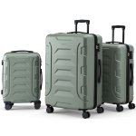Three sage green hard-shell suitcases with wheels