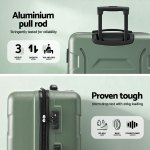 Green hard-shell suitcase with aluminium pull handle