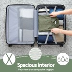 Open suitcase neatly packed with folded clothes