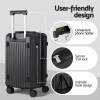 Black hard-shell suitcase with phone holder and TSA lock