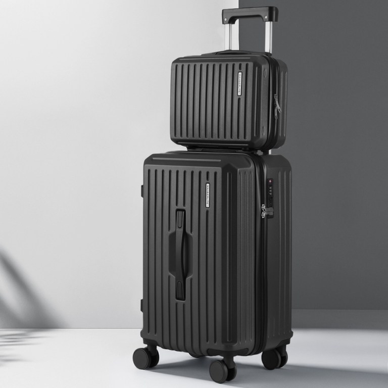 Black hard-shell suitcases with wheels and handle