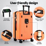 wanderlite 28 trunk luggage suitcase travel 5 wheels type c port tsa orange" Orange suitcase with USB port and cup holder