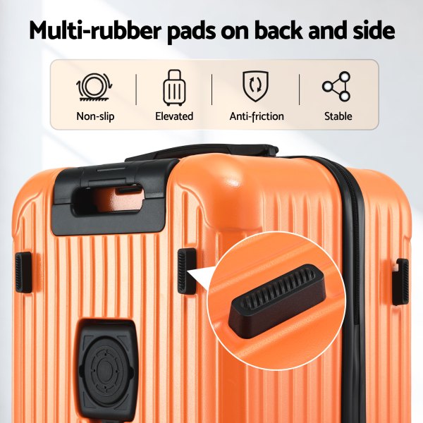 wanderlite 28 trunk luggage suitcase travel 5 wheels type c port tsa orange" Orange suitcase with multi-rubber protective pads