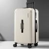 Cream hard-shell suitcase with spinner wheels
