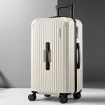 Cream hard-shell suitcase with spinner wheels