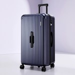wanderlite 32 trunk luggage suitcase travel tsa type c 5 wheels deep indigo" Dark blue hard-shell suitcase with spinner wheels