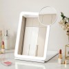 White LED vanity mirror with magnifying attachment