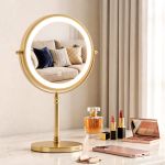 Gold LED vanity mirror on makeup table