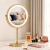 Gold LED vanity mirror on marble dresser