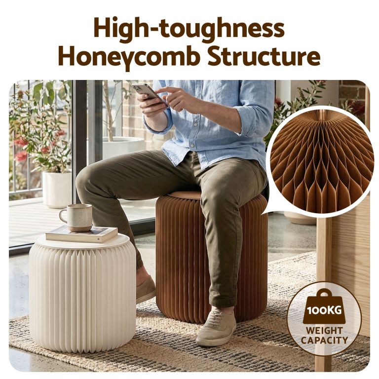 Man sitting on honeycomb structure stool indoors