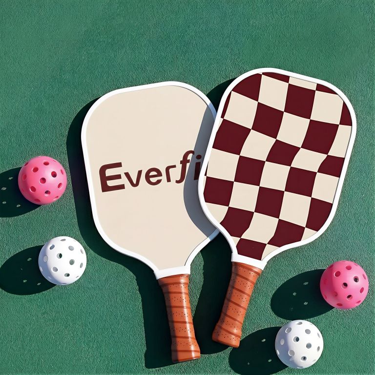 everfit pickleball paddle set fibreglass racquet honeycomb core with bag brown Pickleball paddles and balls on green court
