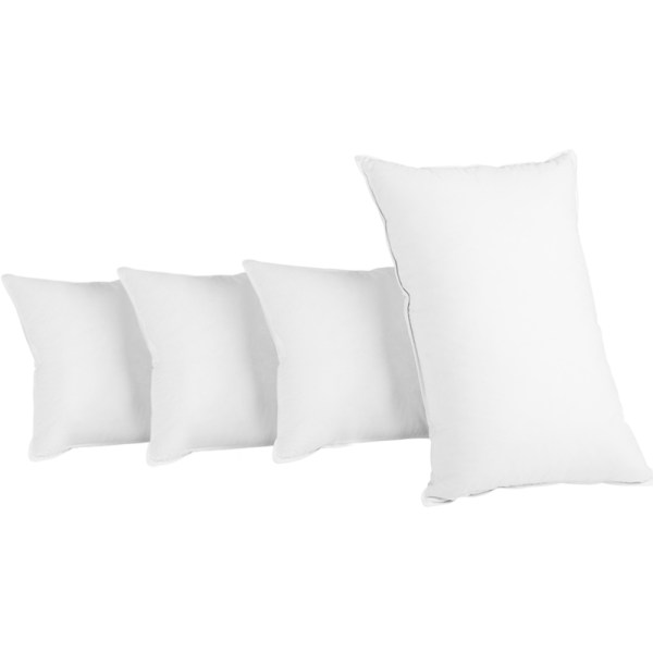 Four white pillows on a plain background