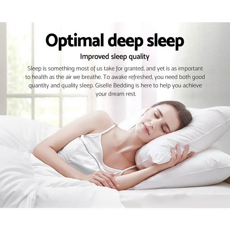 giselle bedding 800gsm microfibre bamboo quilt queen Woman sleeping peacefully on white pillow