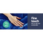 Hand touching soft blue polyester fabric