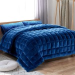 Plush deep blue quilt on modern bed