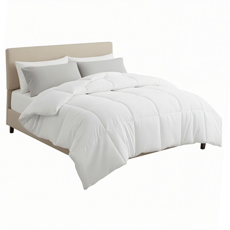 White quilted doona on upholstered bed