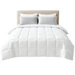 White quilted doona on neatly made bed