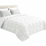 White quilted doona on neatly made bed
