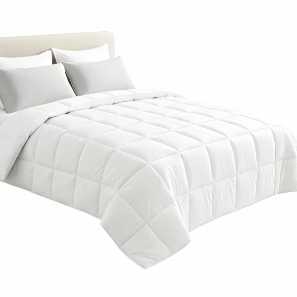 White quilted doona on neatly made bed