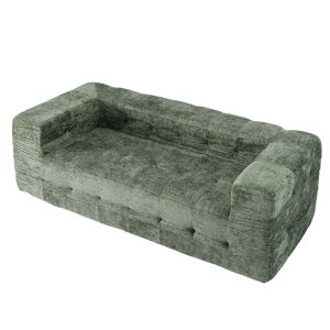 Green tufted fabric sofa on white background