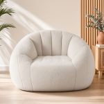sbed m fa 1s bg 00.jpg Cream boucle armchair in sunlit minimalist living room