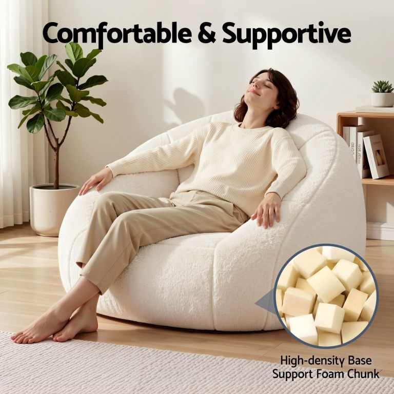 artiss single small boneless couch comfy bean bag for living room faux fur white Woman relaxing in plush supportive armchair indoors