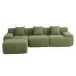 Green corduroy sectional sofa with matching cushions