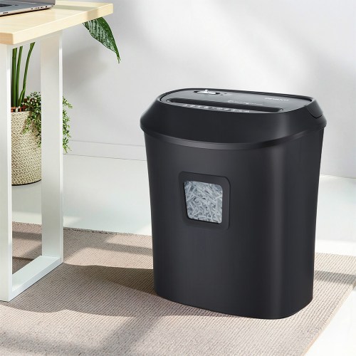 shred 1001c bk 202509082154 00.jpg Black paper shredder under home office desk