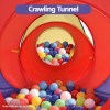 Red crawling tunnel filled with colourful plastic balls